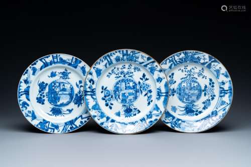 Three Chinese blue and white dishes with raised central meda...