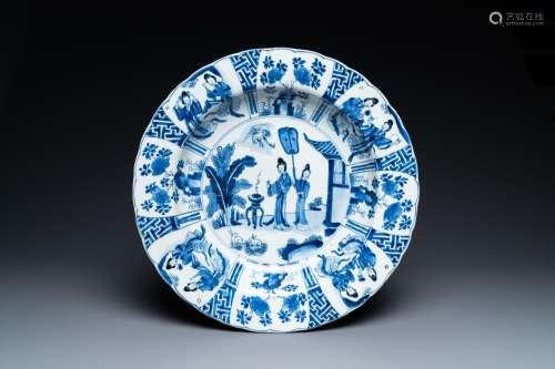 A Chinese blue and white dish with two ladies and two rabbit...