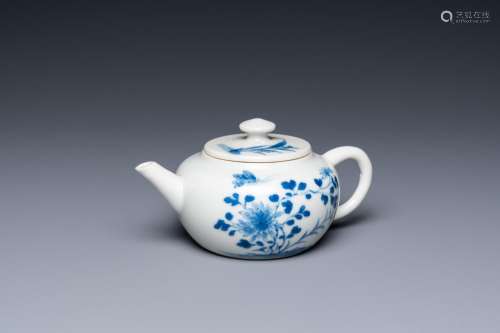 A small Chinese blue and white teapot with floral design, Ka...