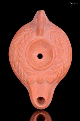 ROMAN TERRACOTTA OIL LAMP WITH LAUREL WREATH