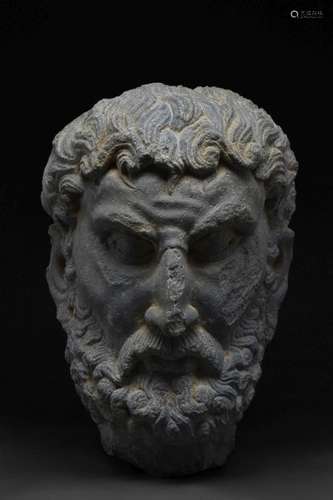 A GANDHARAN SCHIST HEAD OF ATLAS