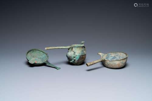 Two Luristan bronze pouring bowls and a spouted vessel, Iran...