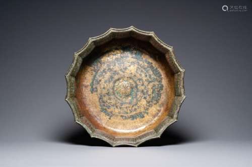A large Seljuk copper-inlaid bronze 'Lagan' basin with engra...