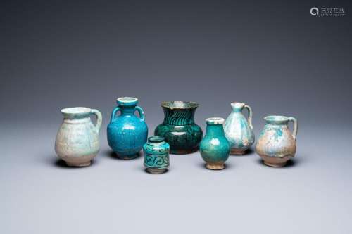 A collection of seven turquoise-glazed jugs and vases, Middl...