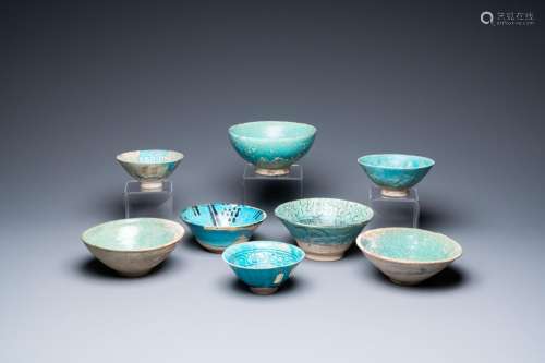 A collection of eight turquoise-glazed bowls, Persia and the...