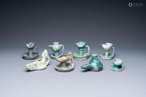 Eight turquoise-glazed oil lamps, Middle-East, 13th C. and l...