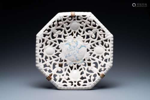 A reticulated octagonal Italian blue, white and yellow faien...