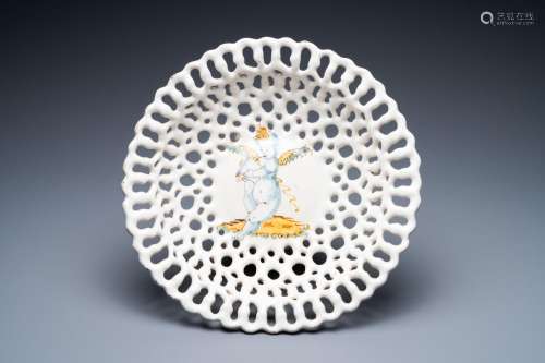 A reticulated Italian blue, white and yellow 'putto' tazza, ...