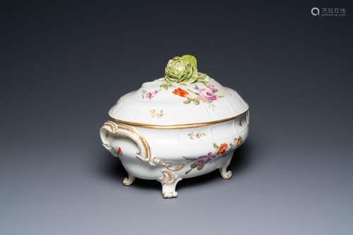 A German polychrome porcelain tureen and cover with floral d...
