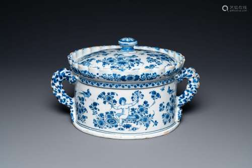 A Dutch Delft blue and white tureen and cover with putti, 17...