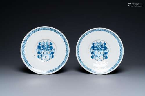 A pair of Dutch Delft blue and white armorial dishes, late 1...
