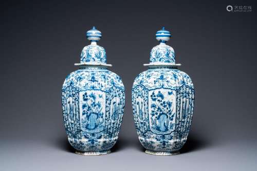 A pair of large ribbed Dutch Delft blue and white covered va...