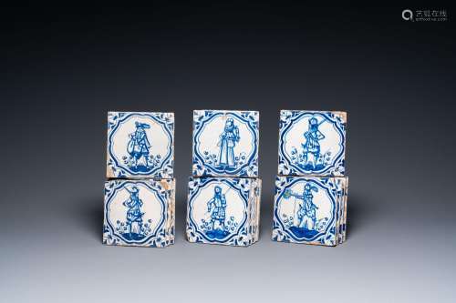 Fourteen Dutch Delft blue and white tiles with mostly Spanis...