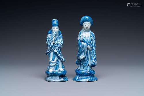 Two Dutch Delft blue and white figures of a Chinese man and ...