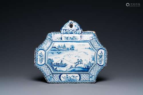 A Dutch Delft blue and white plaque depicting a horse-drawn ...