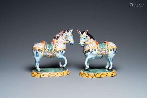 A pair of polychrome Dutch Delft horses, 18th C.