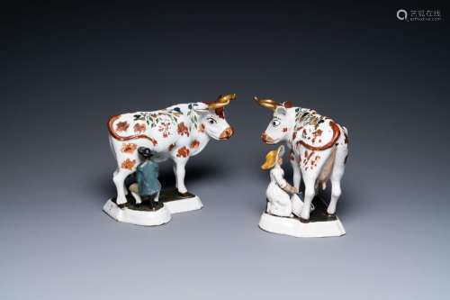 A pair of cold-painted white Dutch Delft milking groups, 18t...
