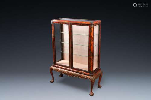A tortoise veneer display cabinet on painted wooden stand, M...