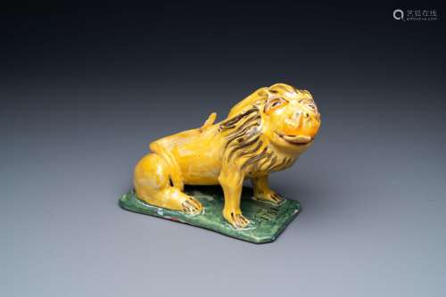 A polychrome Brussels faience model of a lion of Brabant, da...