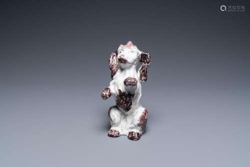 A Brussels faience manganese and white dog, 18th C.