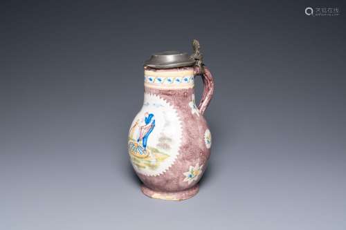 A polychrome Brussels faience ewer with a wheelwright, 18th ...