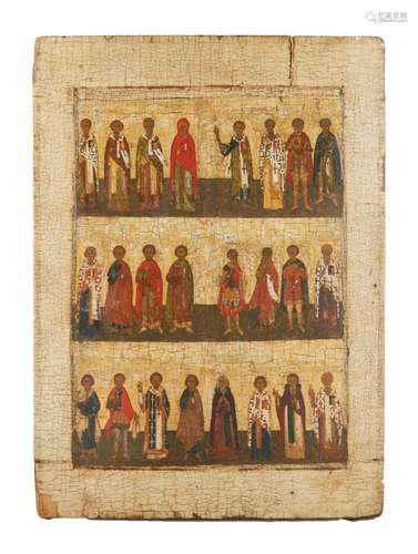 A RUSSIAN ICON OF 24 SAINTS, CIRCA 1560