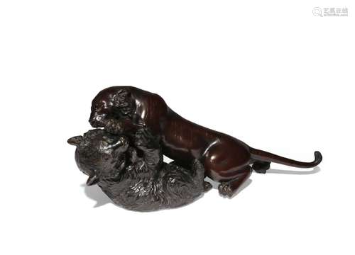 A JAPANESE BRONZE OKIMONO OF A BEAR CUB AND A TIGER