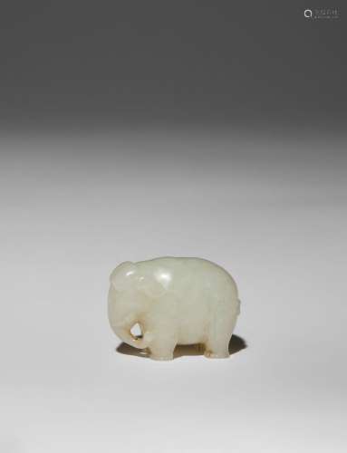 A SMALL CHINESE WHITE JADE CARVING OF AN ELEPHANT