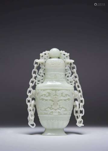 A LARGE CHINESE PALE CELADON JADE VASE AND COVER