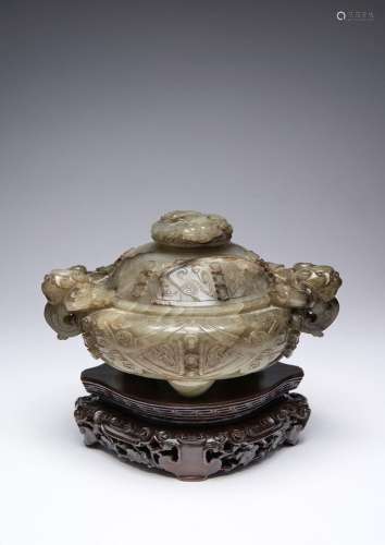 A CHINESE CELADON JADE 'MYTHICAL BEASTS' TRIPOD INCENSE BURN...