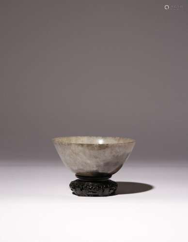 A CHINESE MOTTLED GREY AND BLACK JADE BOWL