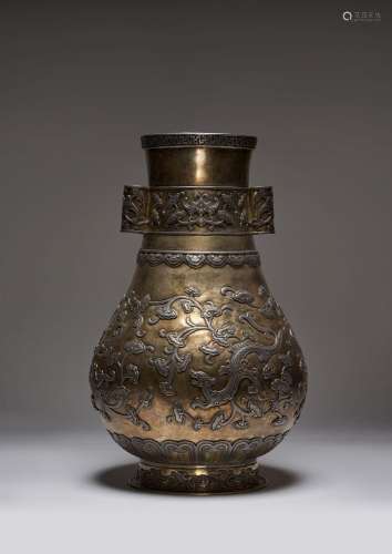 A LARGE CHINESE SILVER AND PARCEL-GILT VASE, HU