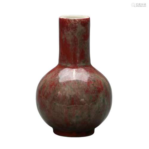 A RED-GLAZED VASE