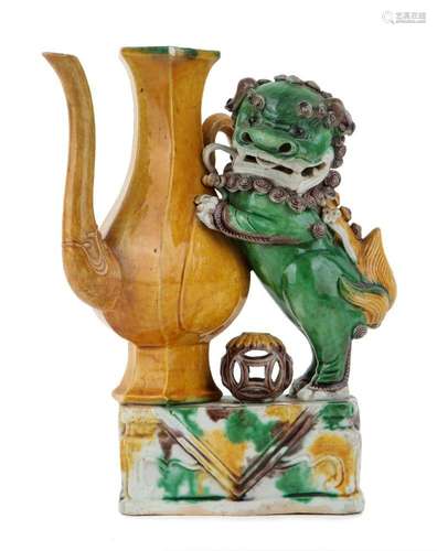 A Chinese biscuit porcelain sancai-glazed 'temple lion' ewer...