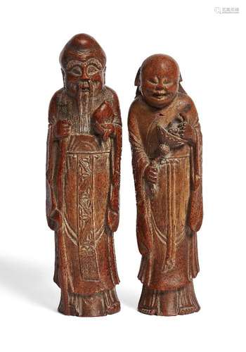 A pair of Chinese carved bamboo figures, early 19th century,...