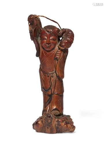 A Chinese carved bamboo figure of a fisherman, late 19th cen...