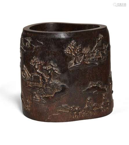 A Chinese carved zitan 'fishing scene' brush pot, 18th/19th ...