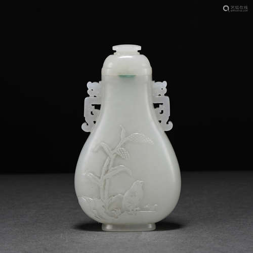 A jade vase and cover