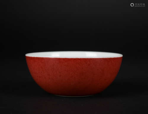 A red-glazed bowl