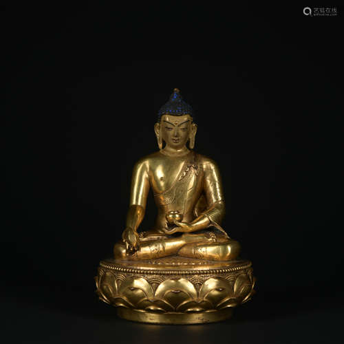 A gilt-bronze statue of Bhaisajyaguru