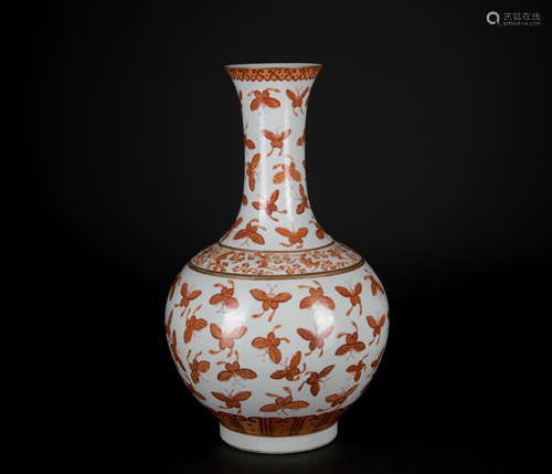 An allite red glazed 'butterfly' vase