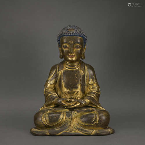 A gilt-bronze statue of Amitabha