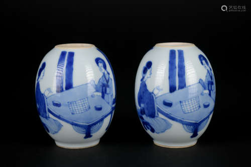 A pair of blue and white 'figure' vase