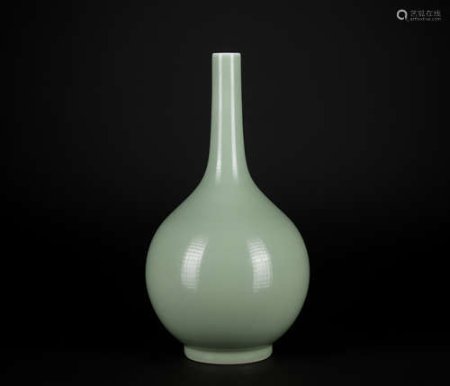 A celadon-glazed vase