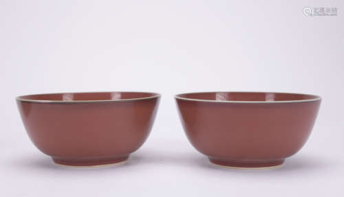 A pair of red-glazed bowl