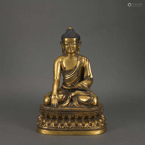 A gilt-bronze statue of Sakyamumi