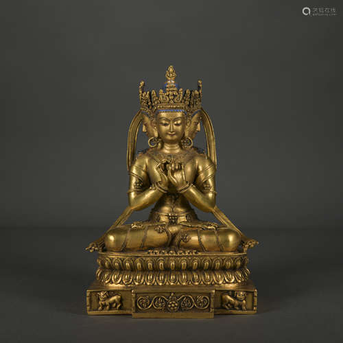 A gilt-bronze statue of Sakyamumi with coronet