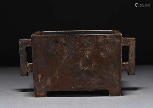 A bronze manger type censer