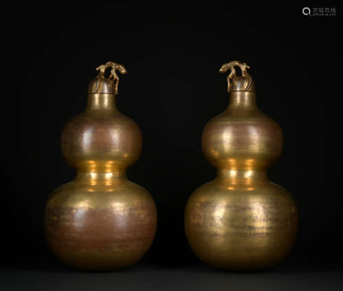 A pair of gilt-bronze gourd-shaped vase