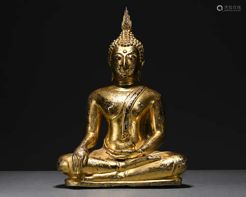 A gilt-bronze statue of Sakyamumi